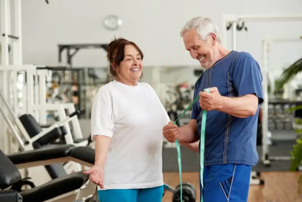 senior woman excited about her weight loss